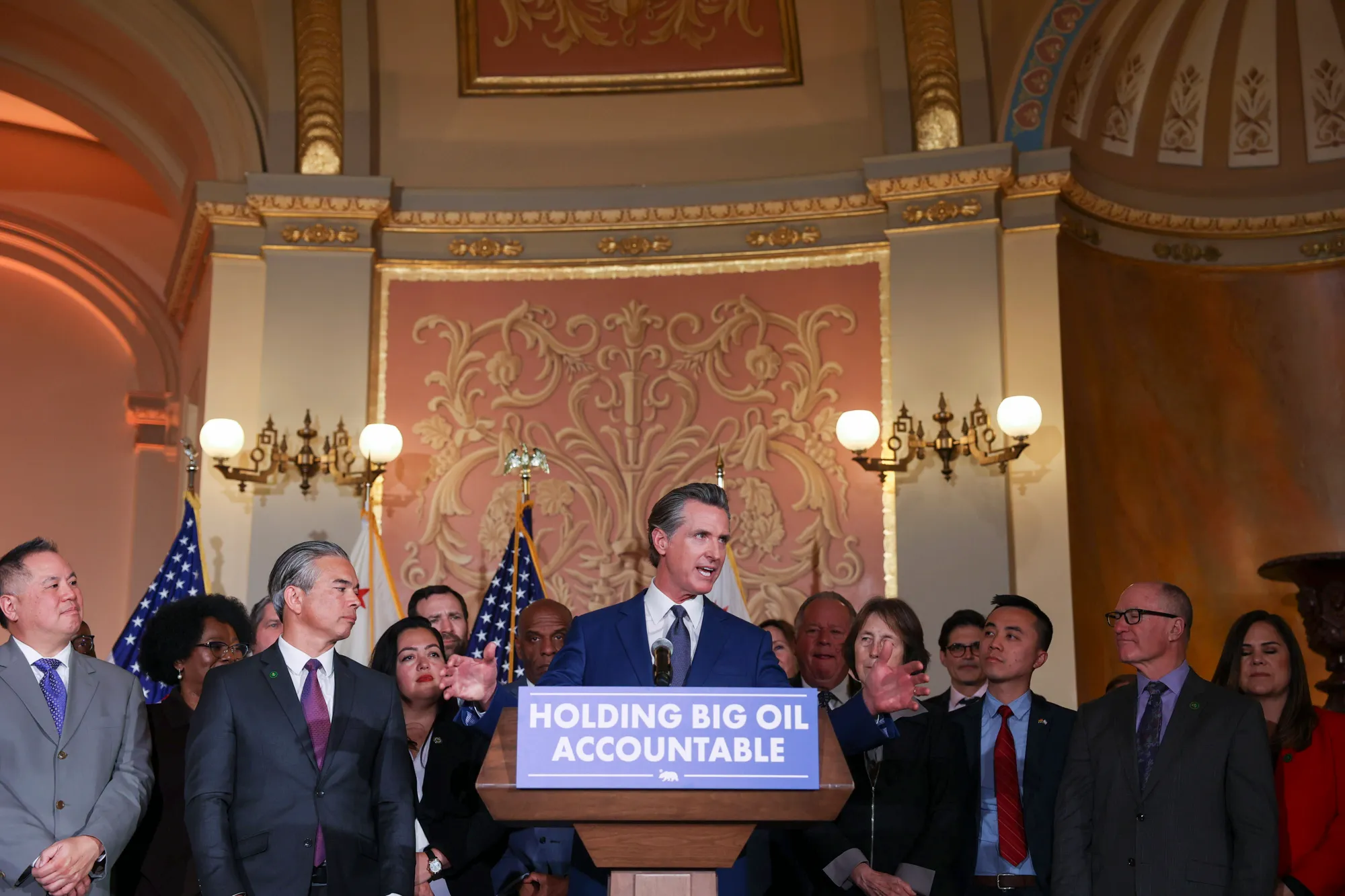 Gov. Gavin Newsom speaks at an event before signing into law his oil profit penalty plan in Sacramento on March 28, 2023