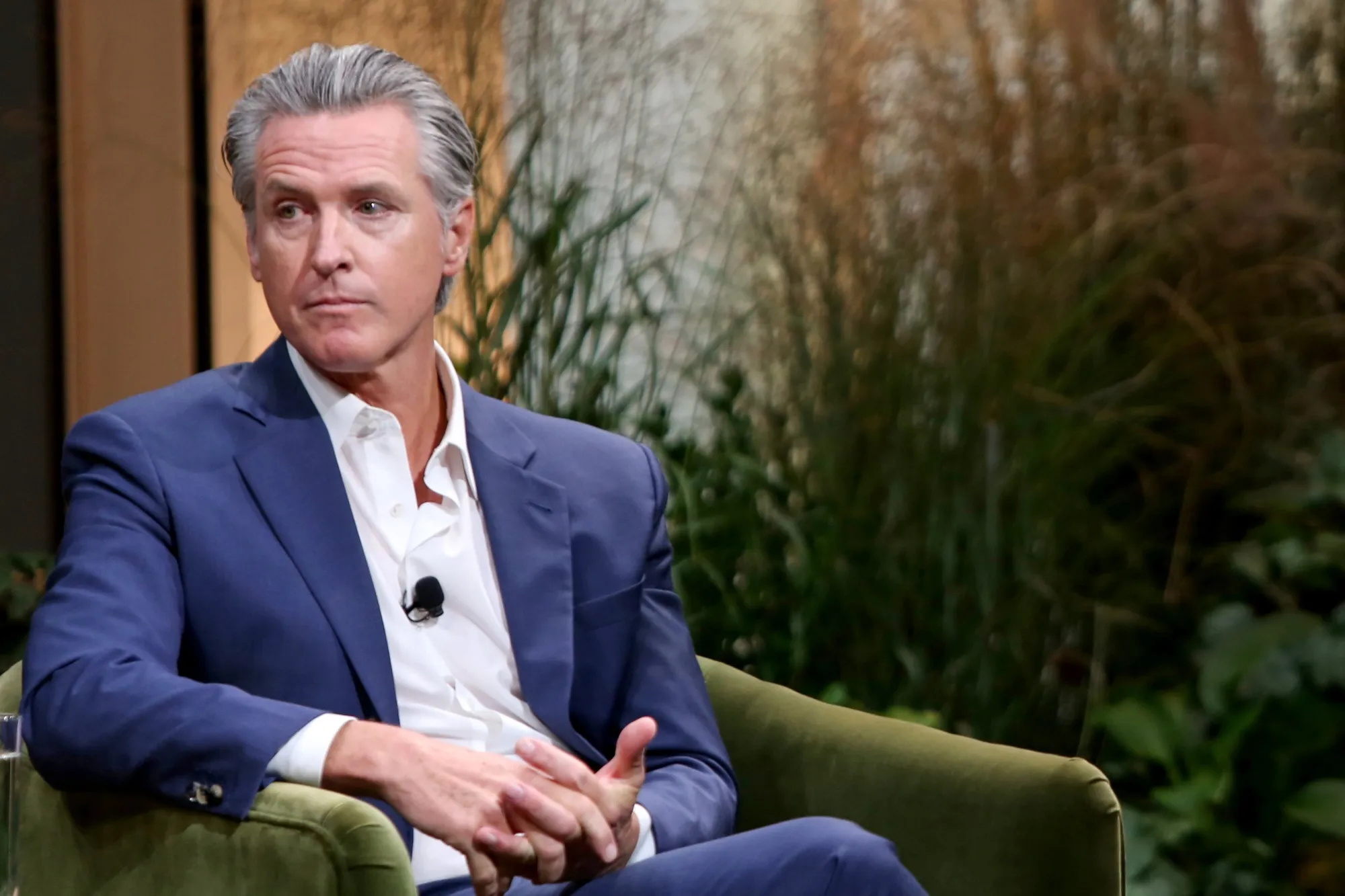 Governor Gavin Newsom sitting