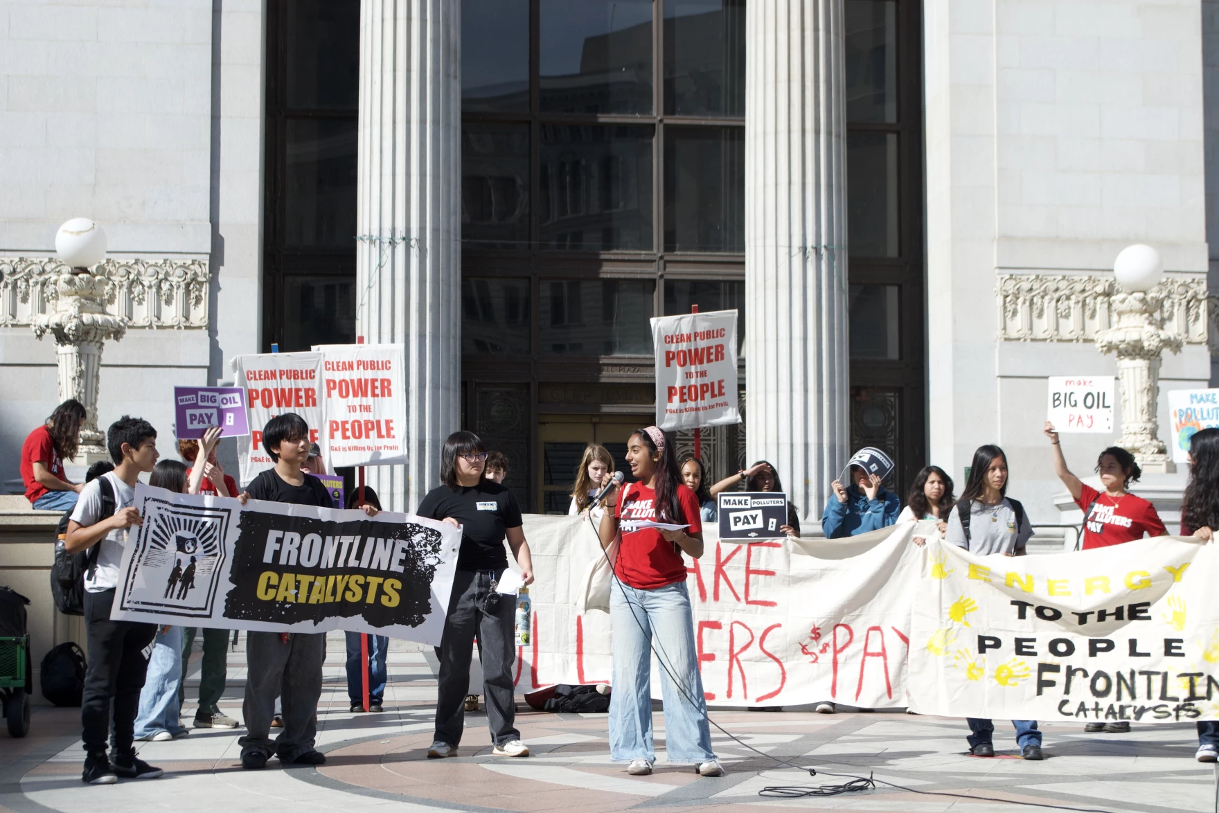 Oakland students walk out of class to support climate bill